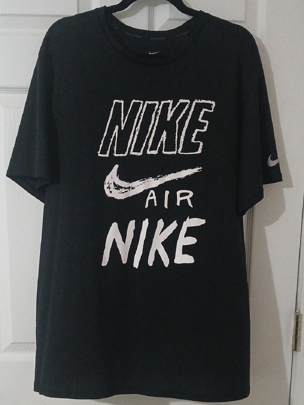 Nike Black Tee with White Swoosh and Graphic Text